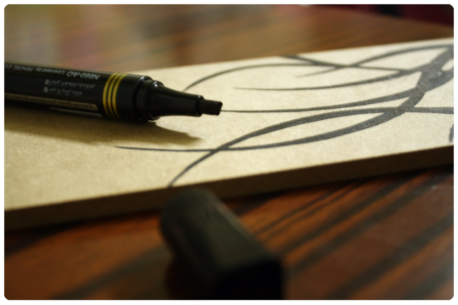 Artist of Anarchy Drawing On Wood