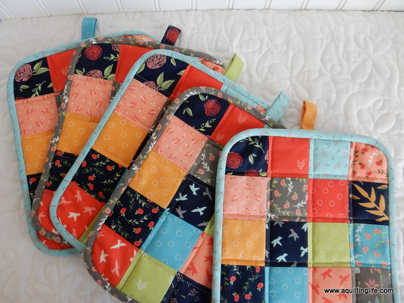 Scrappy Patchwork Potholders A Quilting Life a quilt blog