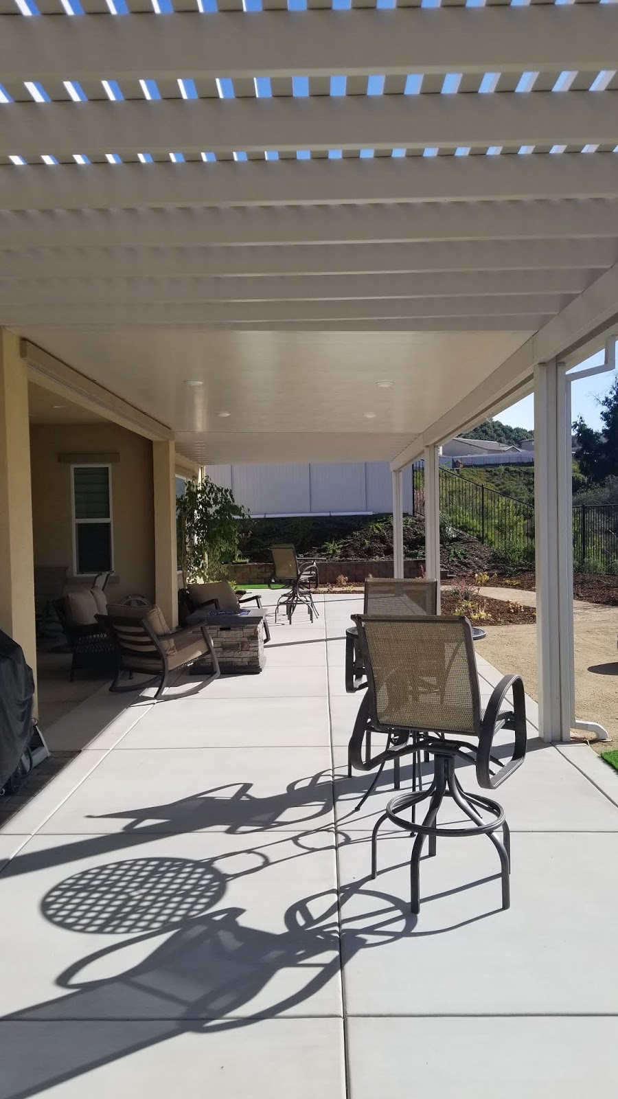 The 2 Minute Gardener Photo Synthetic Shade Structure with Concrete Patio
