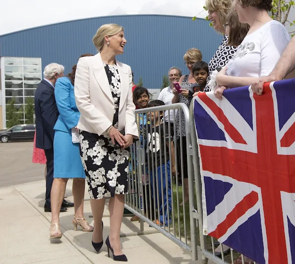 The Countess of Wessex in Edmonton, Canada. Sophie wore Erdem Analena Dress, Prada Suede pumps, Sophie Habsburg clutch, UFO pearl earrings and bracelet.