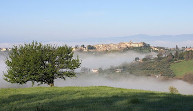 Mist filling the valleys around Collevecchio, one of many beautiful towns in the Sabine Hills in Lazio