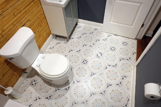 view of finished stencil painted ceramic tile floor