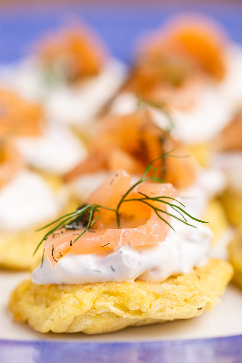 Closeup photo of Keto Blinis with Smoked Salmon Pate on a platter.