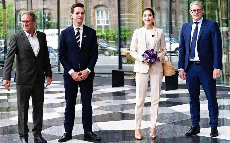 Crown Princess Mary wore a beige one button lapel collar blazer suit and jogging fit trousers from Massimo Dutti