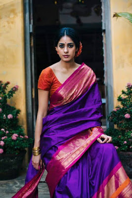 Style traditional Indian silk saree with statement antique jewelry for a festive look.