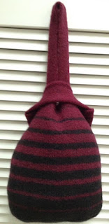 Japanese knot bag knitted with stripes and fulled