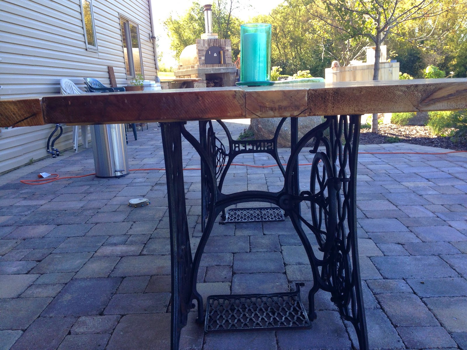 Live to Live Antique Singer Sewing Machine Base Made into an Outdoor Table