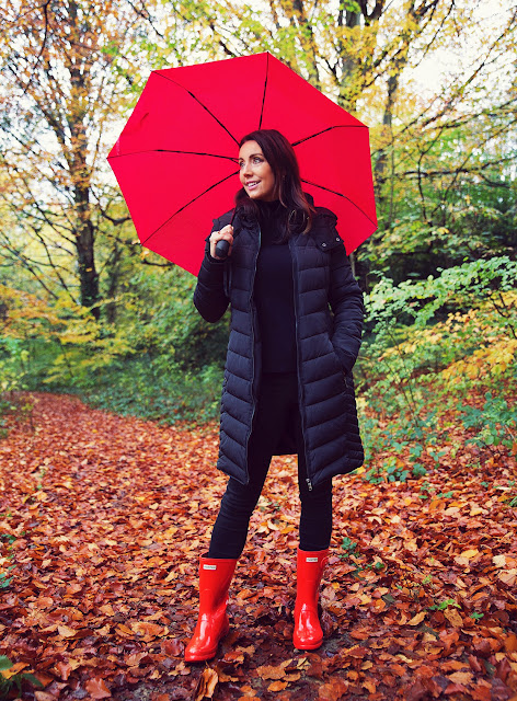 woman in woodland wearing red wellies