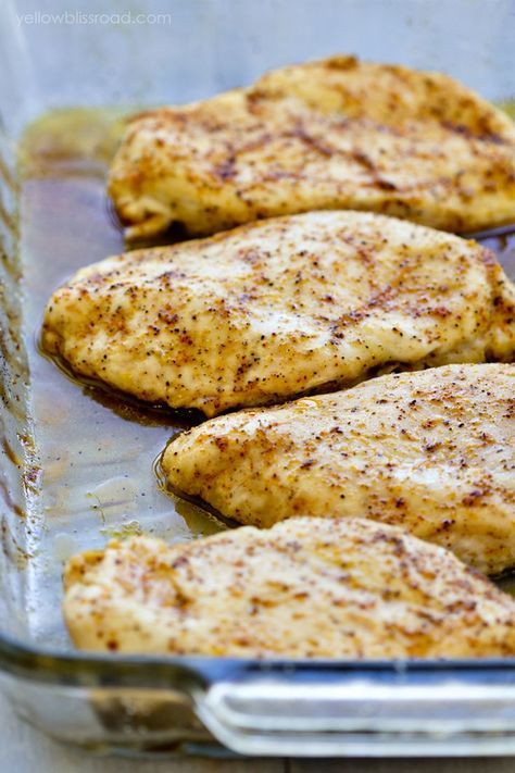 Learn how to make the most flavorful, tender and juicy baked chicken breast - no more dry chicken! With a five minute prep time and just 20 minutes in the oven, you'll have this dinner on the table in less than 30 minutes