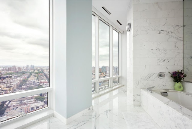 Photo of the view from the bathroom in one of the most beautiful penthouses 