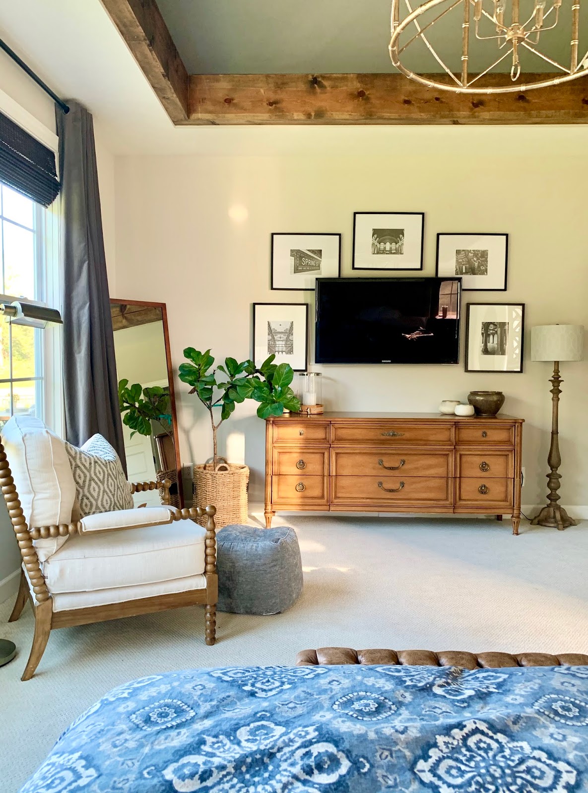 Master bedroom with TV gallery wall 