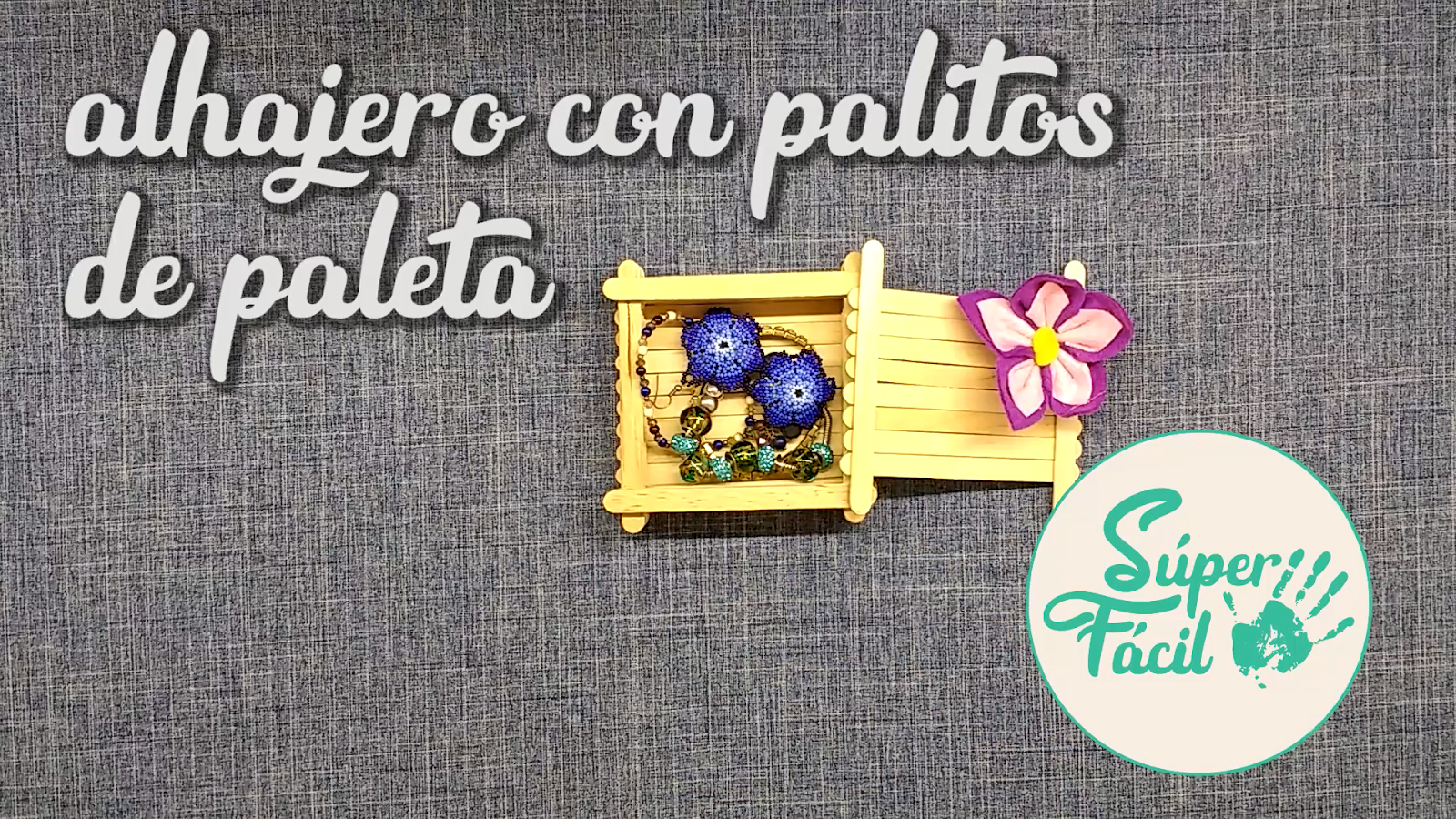 Alhajero hecho con palitos de paleta / Abatelenguas