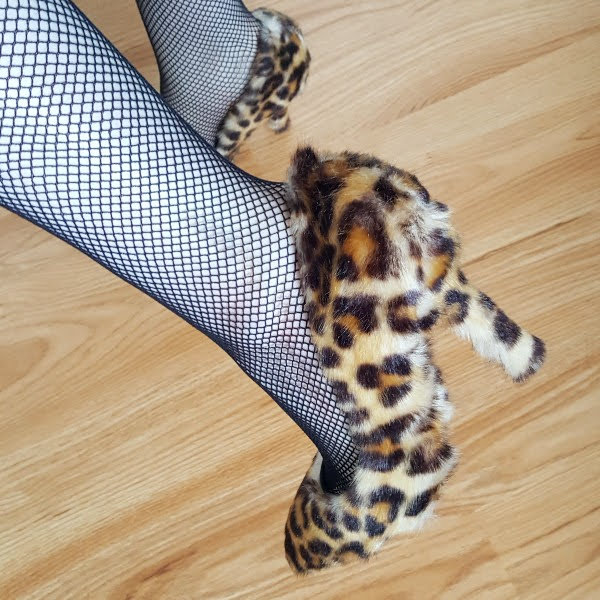 wearing Dolce & Gabbana faux fur leopard print heels