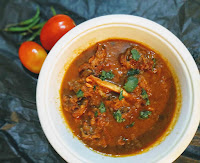 Serving mutton masala (lamb masala)