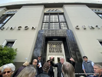 tour guide Rick Evans in front of Rincon Center Annex during Commonwealth Club Waterfront tour in San Francisco, California