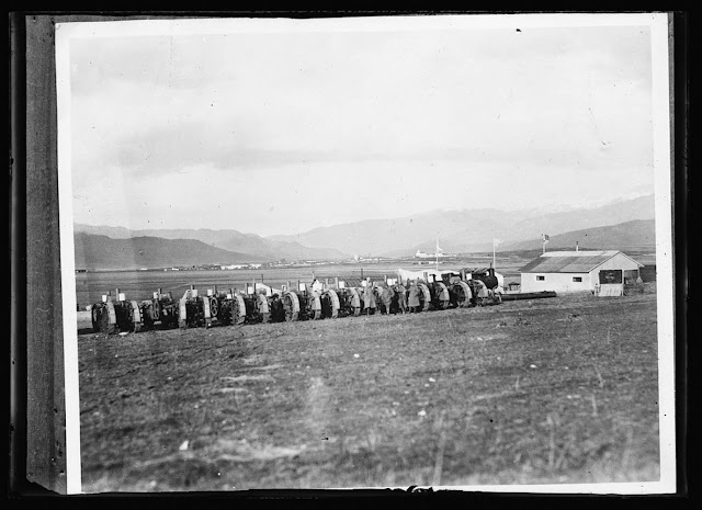 A battery of American tractors in the Monastir valley of Serbia sent by the A.R.C. to replace the horses and oxen stolen from the peasants by the enemy. They are to be loaned to the farmers of Serbians to help them prepare their land and regain their economic independence. The Red Cross has an operating crew and a repair shop to insure full use of this agricultural machinery. It is estimated that the Serbians lost 224,000,000 worth of horses, farming implements and machinery as a result of the German and Austrian invasion