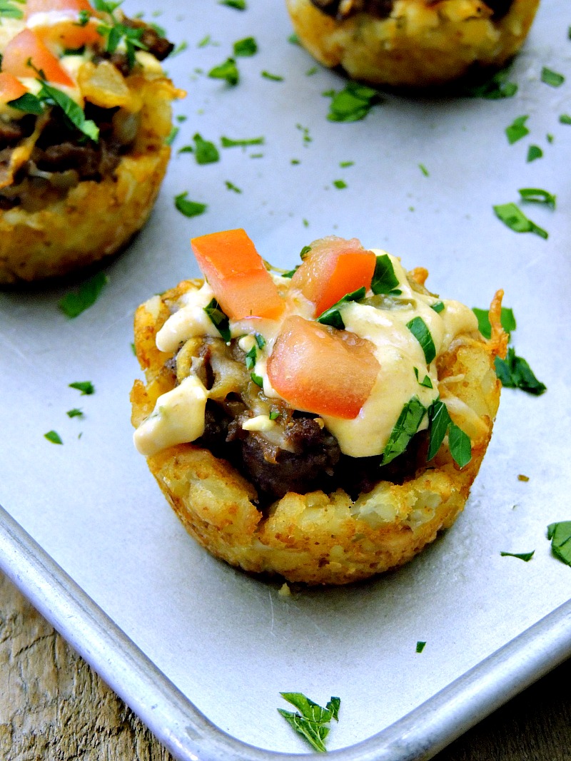 Change up your burger game with these fun, kid friendly, Tater Tot Cheeseburger Cups. From www.bobbiskozykitchen.com
