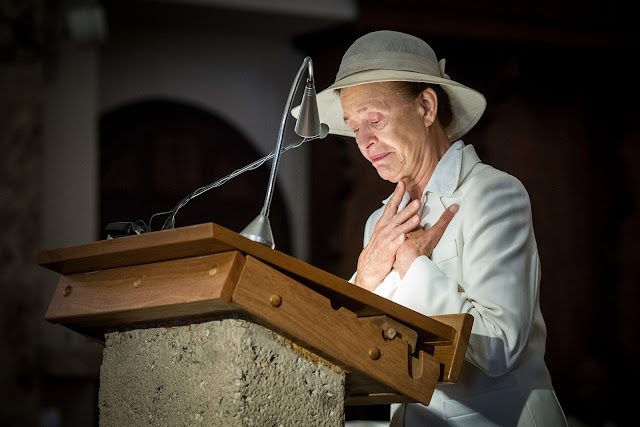 Marcelline Udry-Dumoulin at her parent's funeral