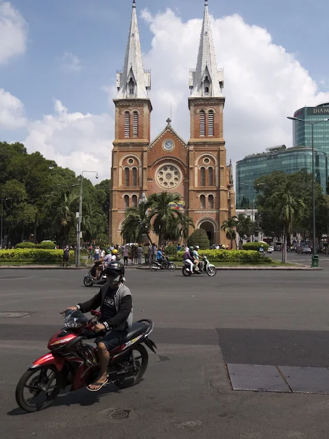 Cathedral and traffic in Ho Chi Minh City Vietnam