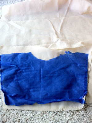 Lay the pieces of lining out on the fabric you're using for lining.