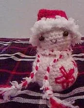 http://www.ravelry.com/patterns/library/candy-cane-snowman