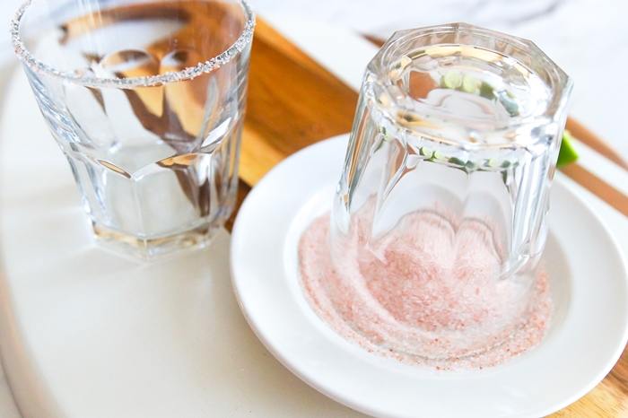 rimming glasses with pink sea salt