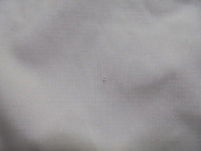 傷 右前身頃表腹部付近