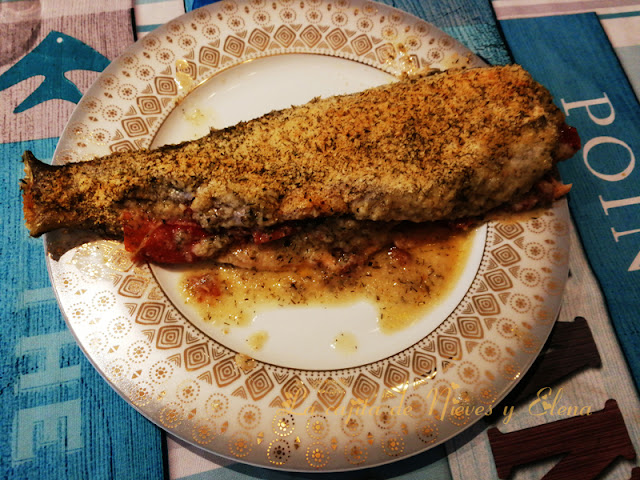 Trucha al horno con jamón  y tomate en aceite