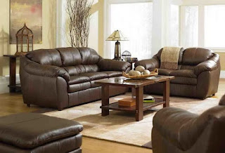 6 Photos Gallery of Living Room Decorating Ideas with Brown Leather Furniture leather sofa living room with wooden classic gloss table but with bright modern room nuance
