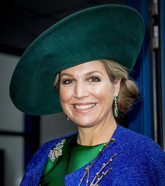 2018 Dutch Organic Trade Fair at IJsselhallen Convention Center in Zwolle. Queen Maxima wore Natan dress and Natan shoes, green diamond earrings