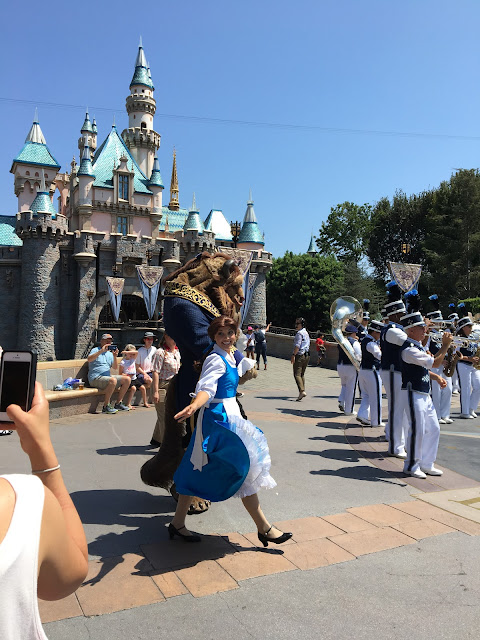 Belle and Beast in Front of Sleeping Beauty Castle Disneyland