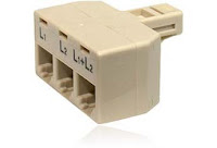 A splitter that takes an RJ14 two-line jack and converts it to two RJ11 one-line jacks