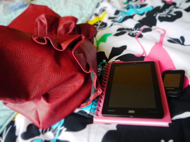 Handbag and notebook ready for work