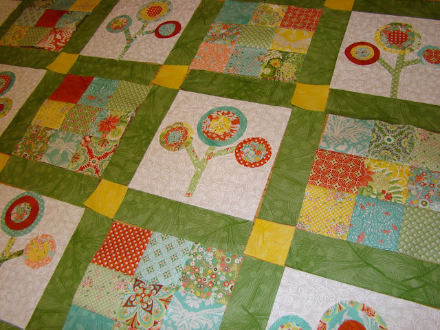 Bloom Where You Are Planted raw edge applique flower quilt