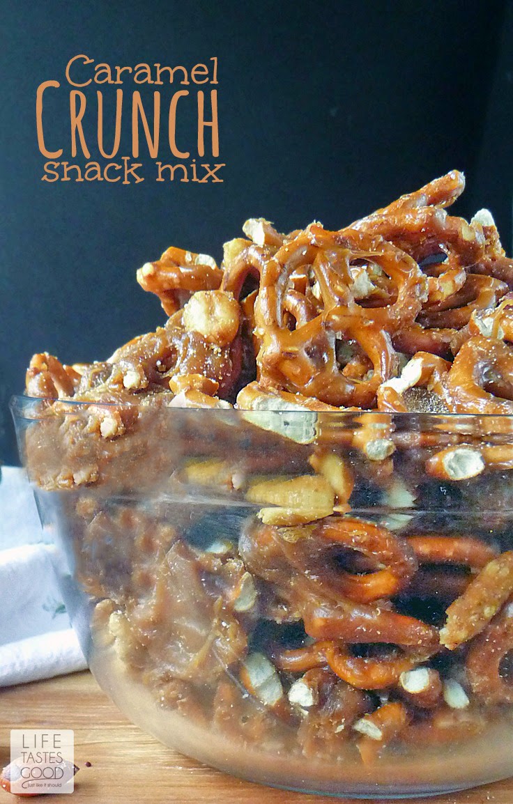Caramel Crunch Snack Mix #GoNutsforNuts | by Life Tastes Good is loaded with mixed nuts and pretzels all covered in a crunchy, rich caramel coating. It is an addicting snack mix that will be a big hit at holiday parties and makes a great gift everyone will love!