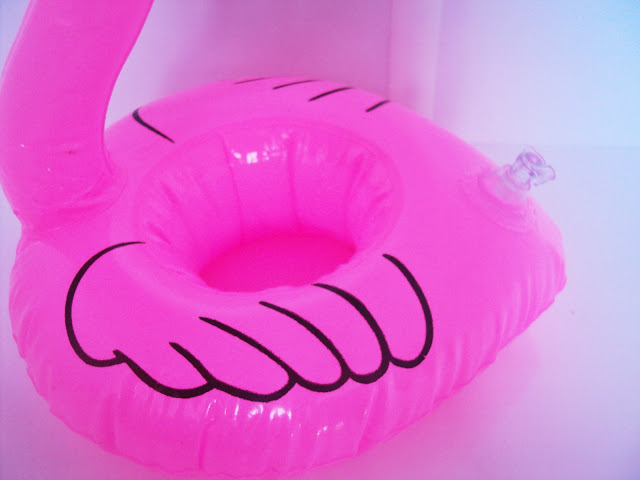http://www.rosegal.com/home-decor/cute-flamingo-shape-floating-inflatable-drink-holder-513008.html?lkid=88916