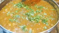Sprinkled fenugreek and chopped coriander leaves over the gravy for chole chickpeas recipe