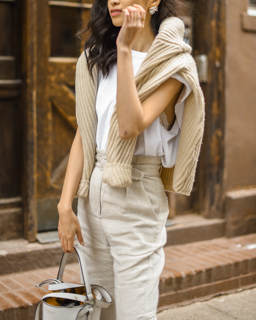 Belted linen trouser with ribbed knit sweater, Spring casual style, neutral spring outfits in New York, white bucket bag outfit ideas, Spring outfits layering, transitional style, Acne Studios Deborah Sweater - FOREVERVANNY.com