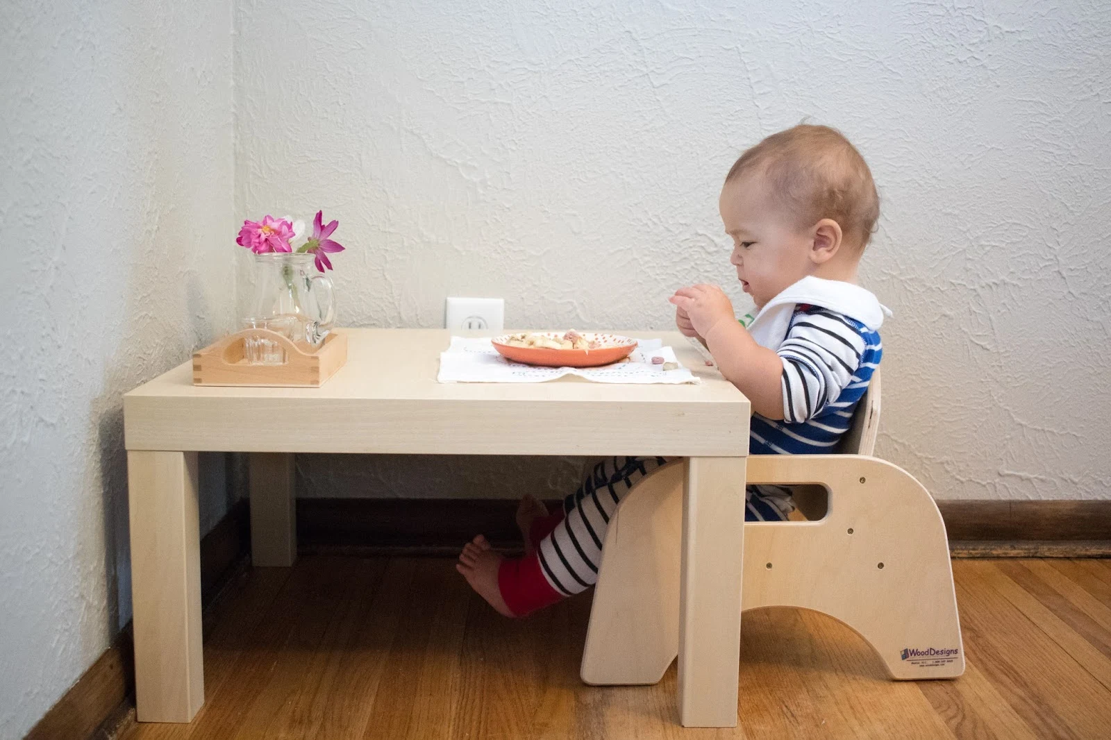 A look at different Montessori home setups for baby eating spaces. These small weaning tables are a perfect baby activity area and provide opportunities for independent eating