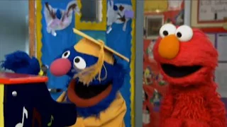 Professor Grover and Elmo play the piano. Sesame Street Preschool is Cool ABCs With Elmo.
