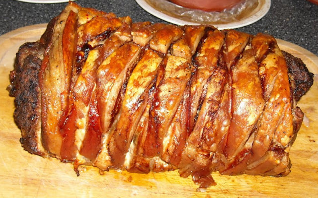 Food Lust People Love: Double Pork Stuffed Pork Roast is pork belly with crackling, stuffed with two pork tenderloins and sausage stuffing made with ground pork and Italian sausage. #SundaySupper