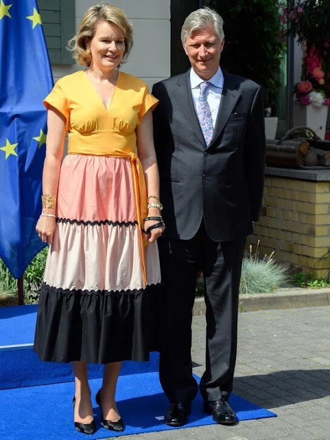 Princess Sophie wore a lemon print fit and flare midi dress from Oscar De La Renta. Mathilde wore a light pink and black skirt and yellow top