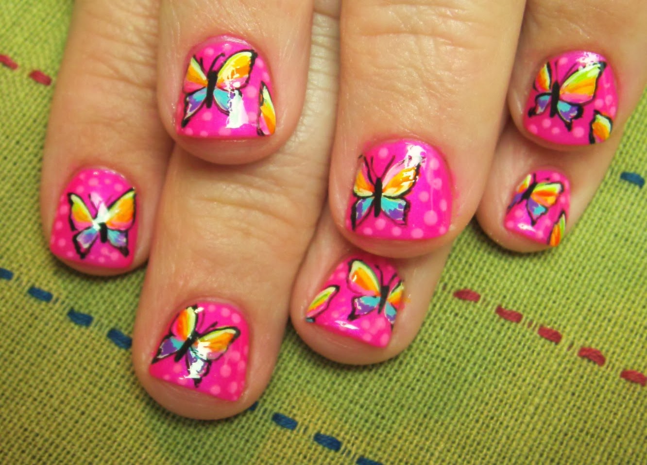 spring nail design with butterflies