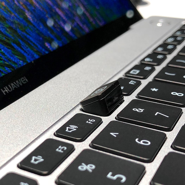 The Matebook Pro has it webcam docked on the keyboards Cyber Tech Templar