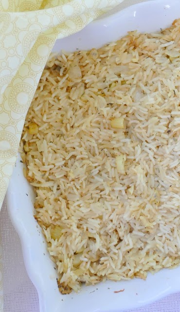 Oven Baked Rice Pilaf in a white casserole.