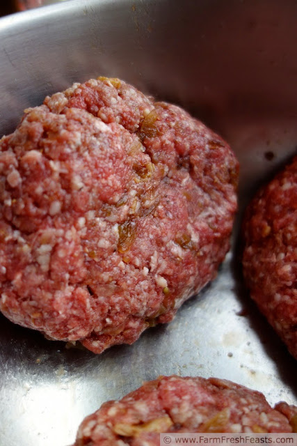 photo of a burger patty flavored with green tomato bacon jam