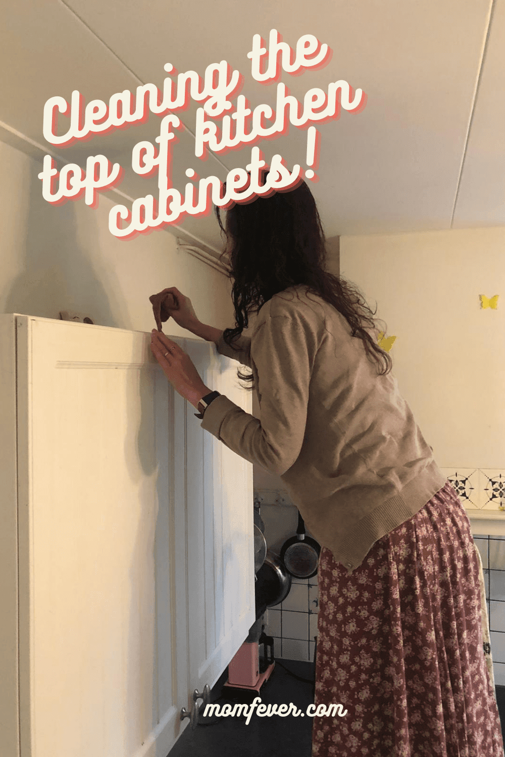 Cleaning top of kitchen cabinets