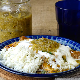 A rich vegetarian dish, these avocado, bell pepper, and caramelized onion enchiladas are spiced with roasted Hatch chiles and covered in plenty of cheese.