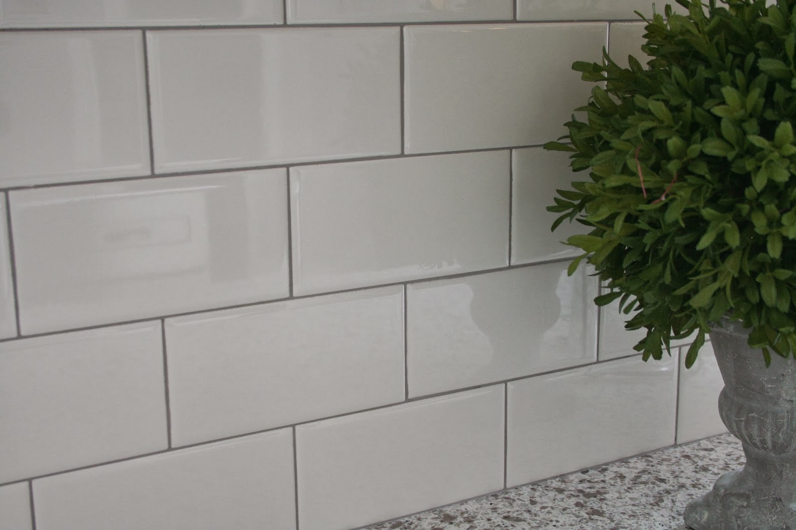 white subway tiles light grey grout kitchen