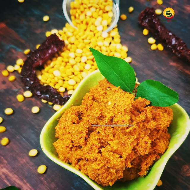 Kadalai Paruppu thogayal is an exotic recipe from Tamil Nadu. A dip made by roasting and grindimg the lentils ,spices to serve as an accompaniment. Kadalai Parippu thogayal, split chick peas dip , how to make thohayal at home , paruppu thohayal, paruppu thuvayal , kadala paruppu thogayal